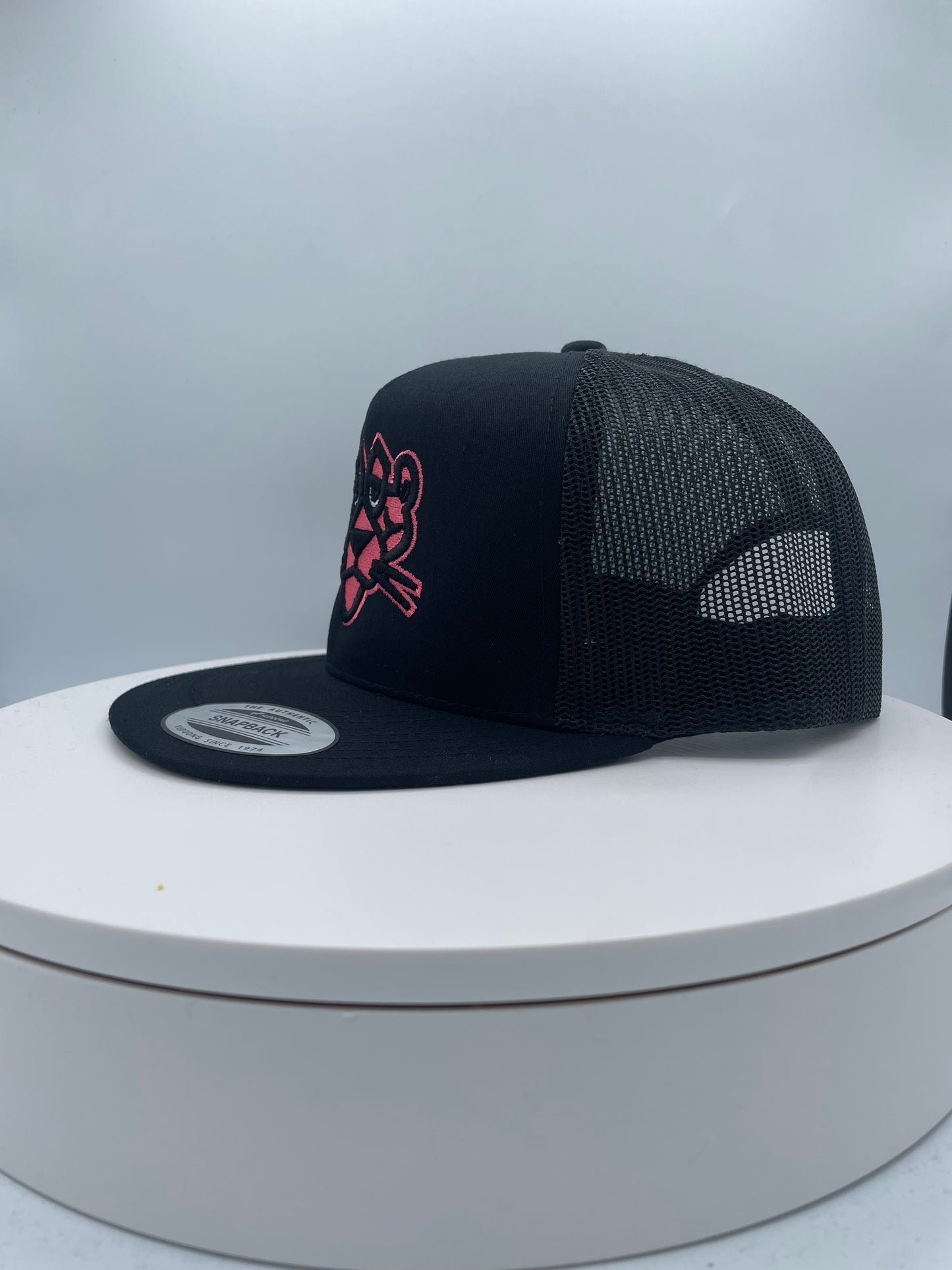 Panther Embroidery Trucker Hat.