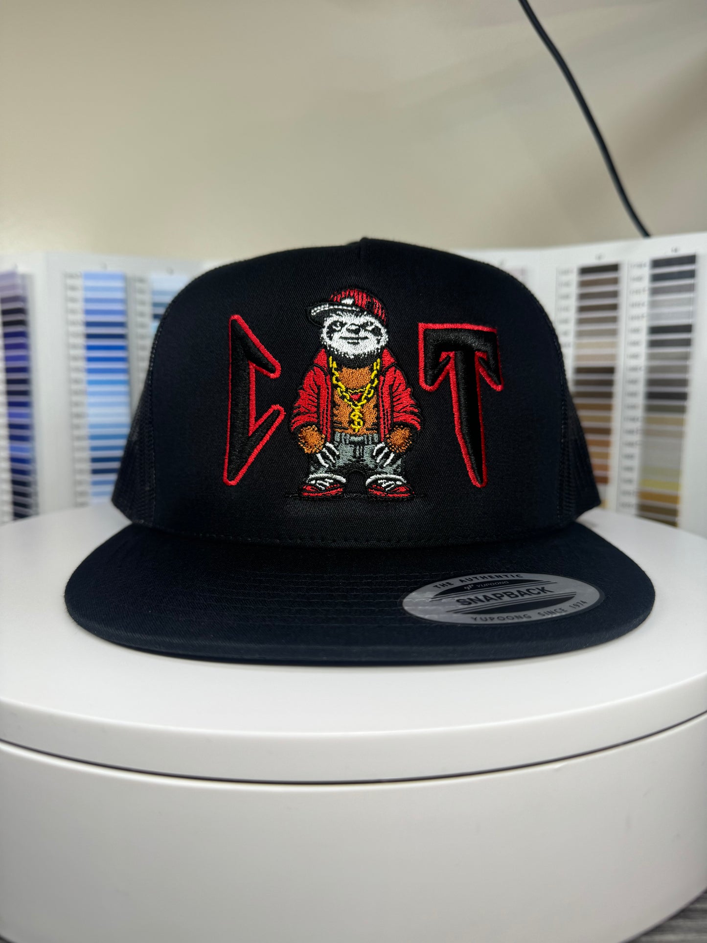 Corridos Tumbados Trucker hat.