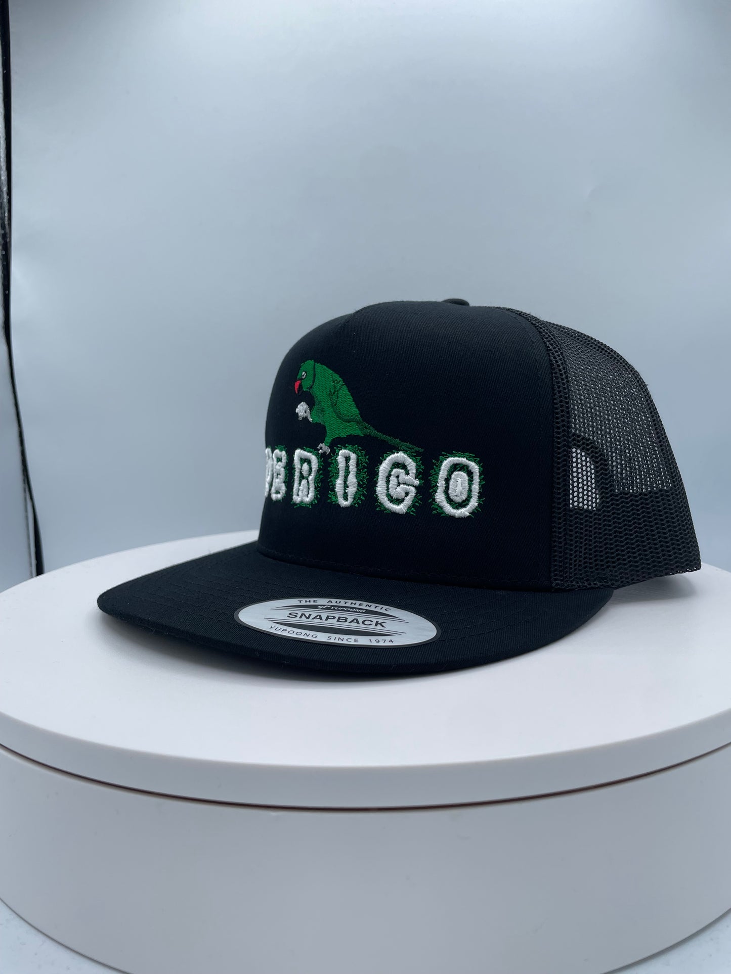 Perico Puff Embroidery Trucker hat.