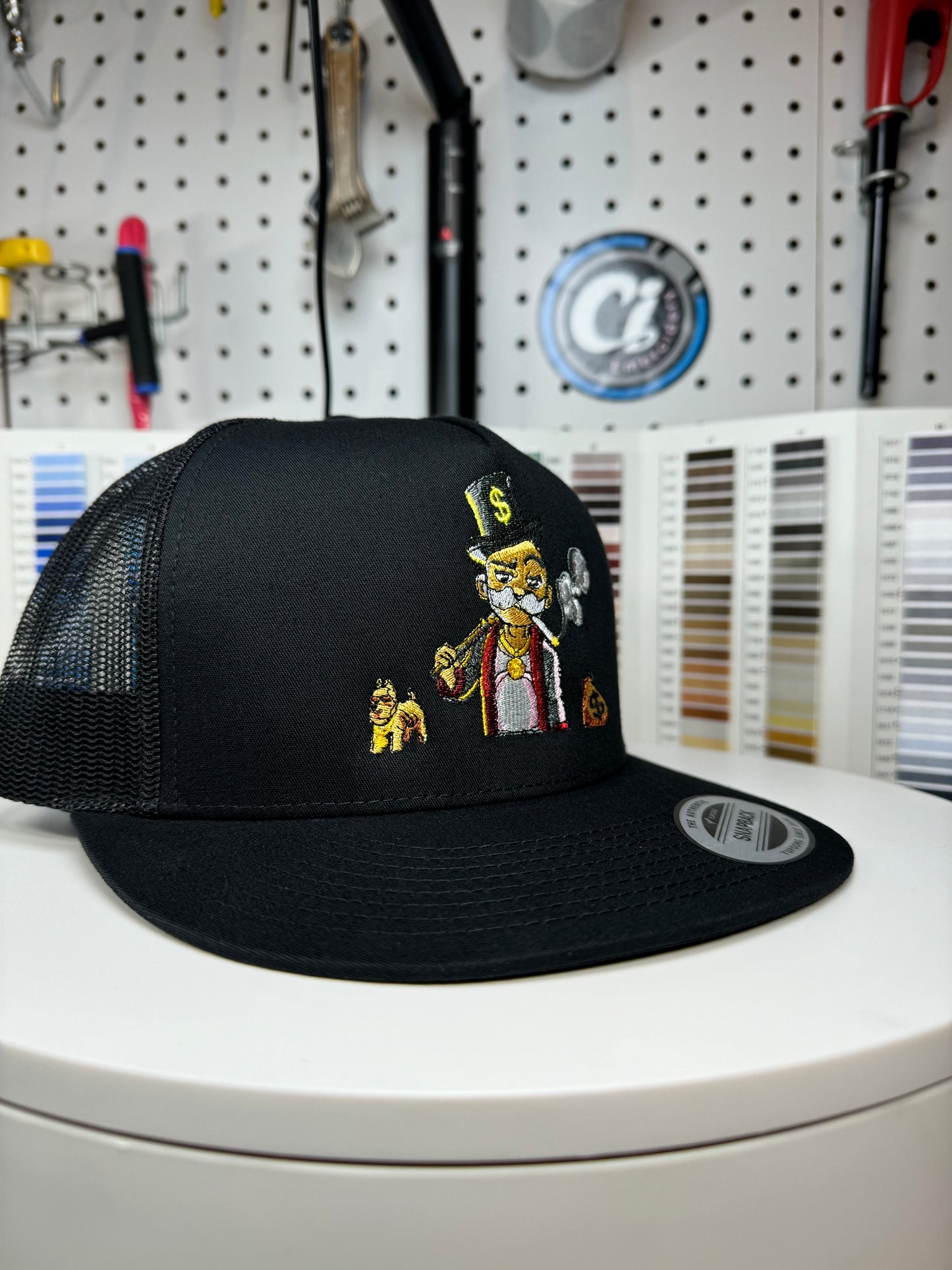 Mr. Monopoly Belico Embroidered Trucker Hat.