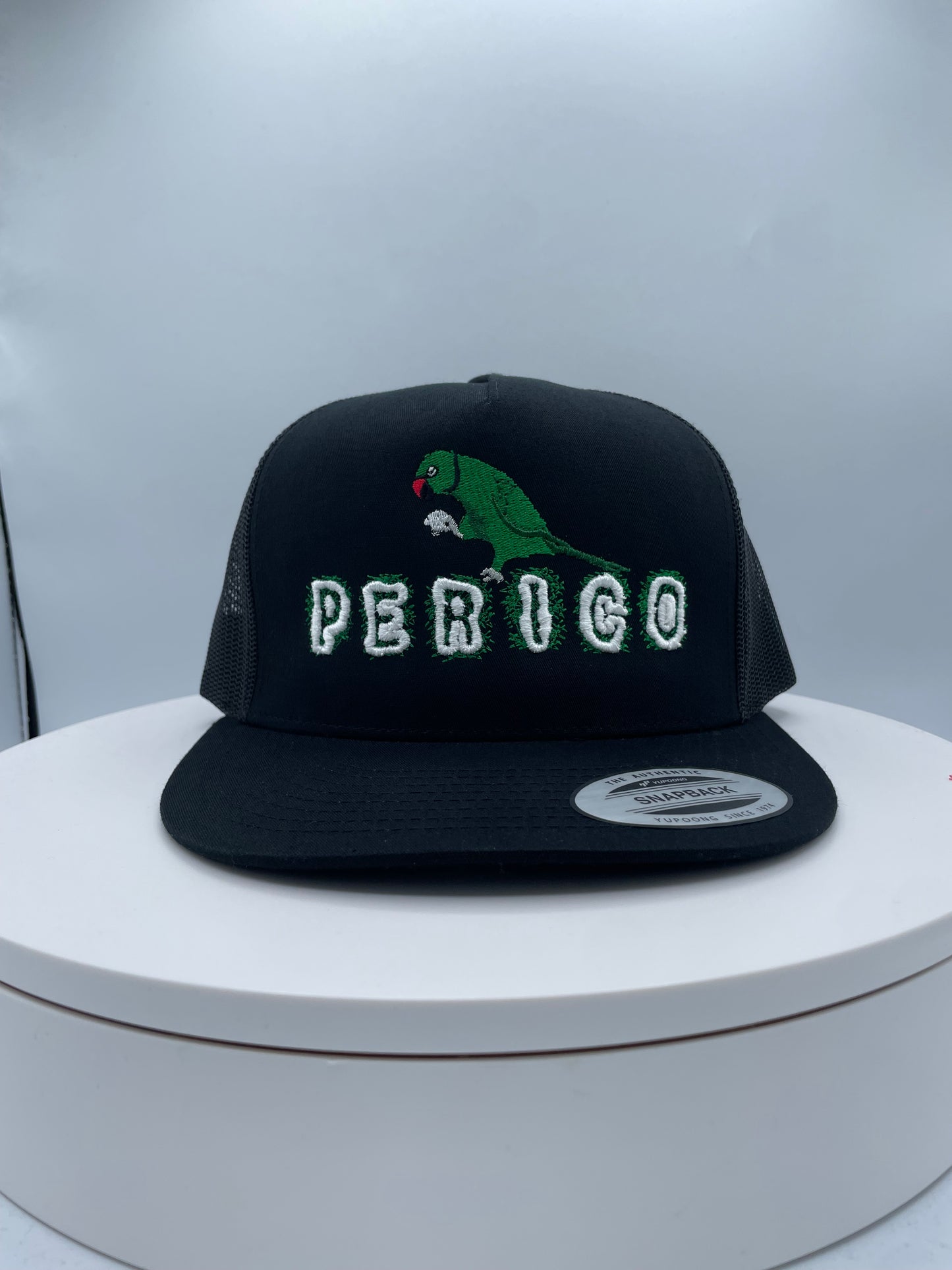 Perico Puff Embroidery Trucker hat.