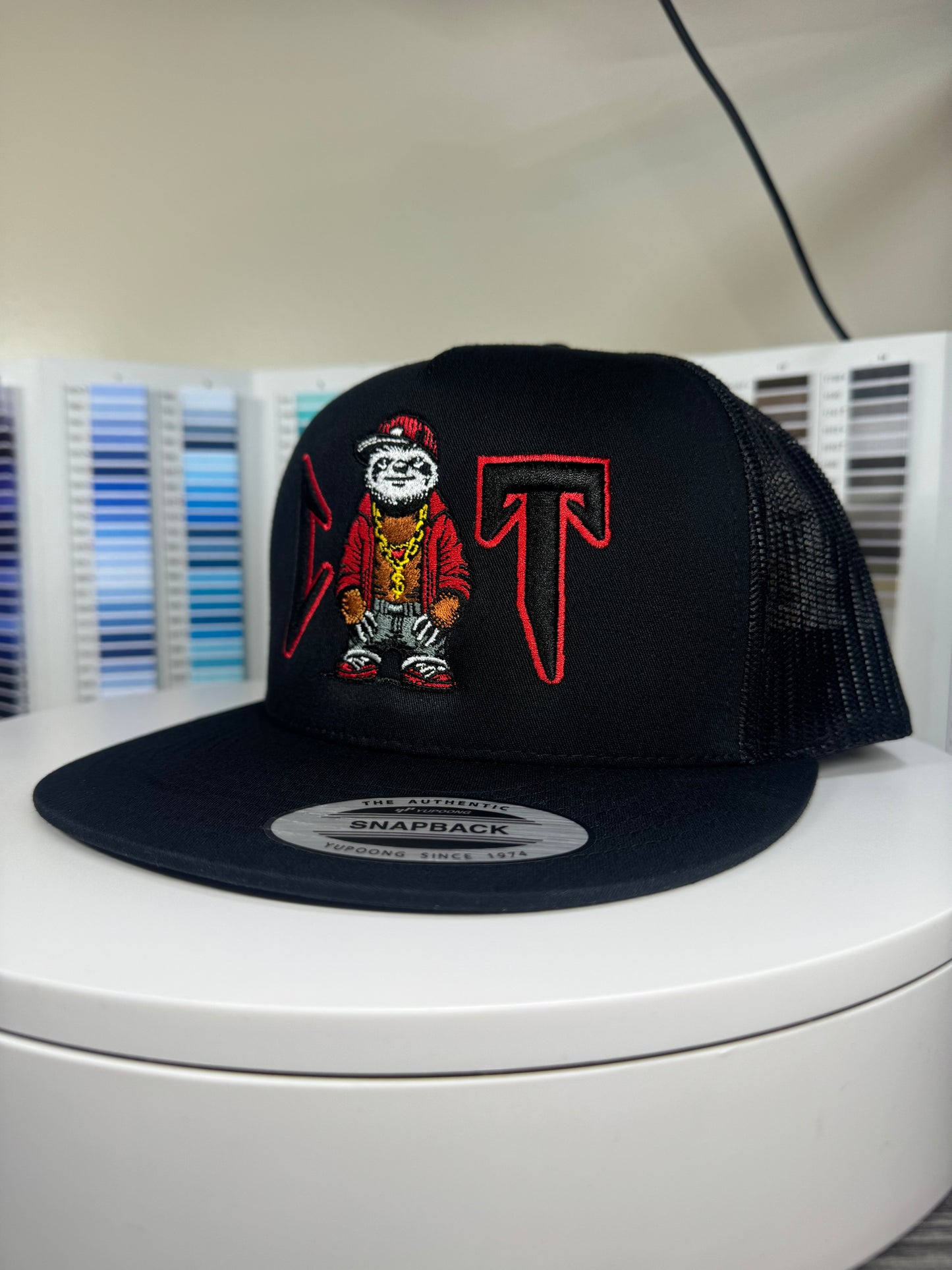 Corridos Tumbados Trucker hat.