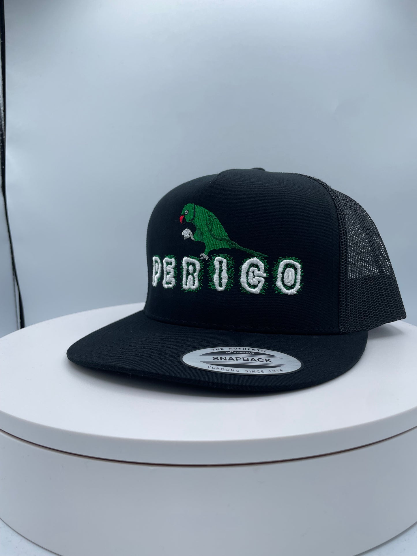 Perico Puff Embroidery Trucker hat.