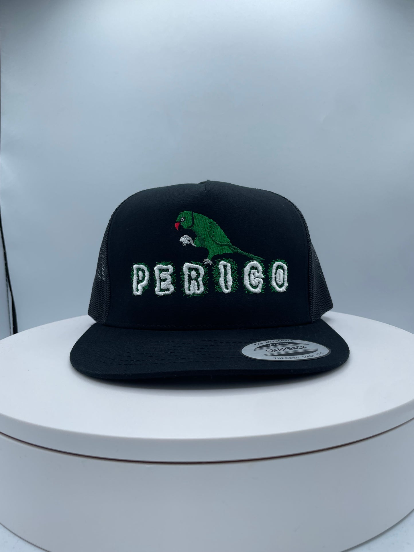 Perico Puff Embroidery Trucker hat.