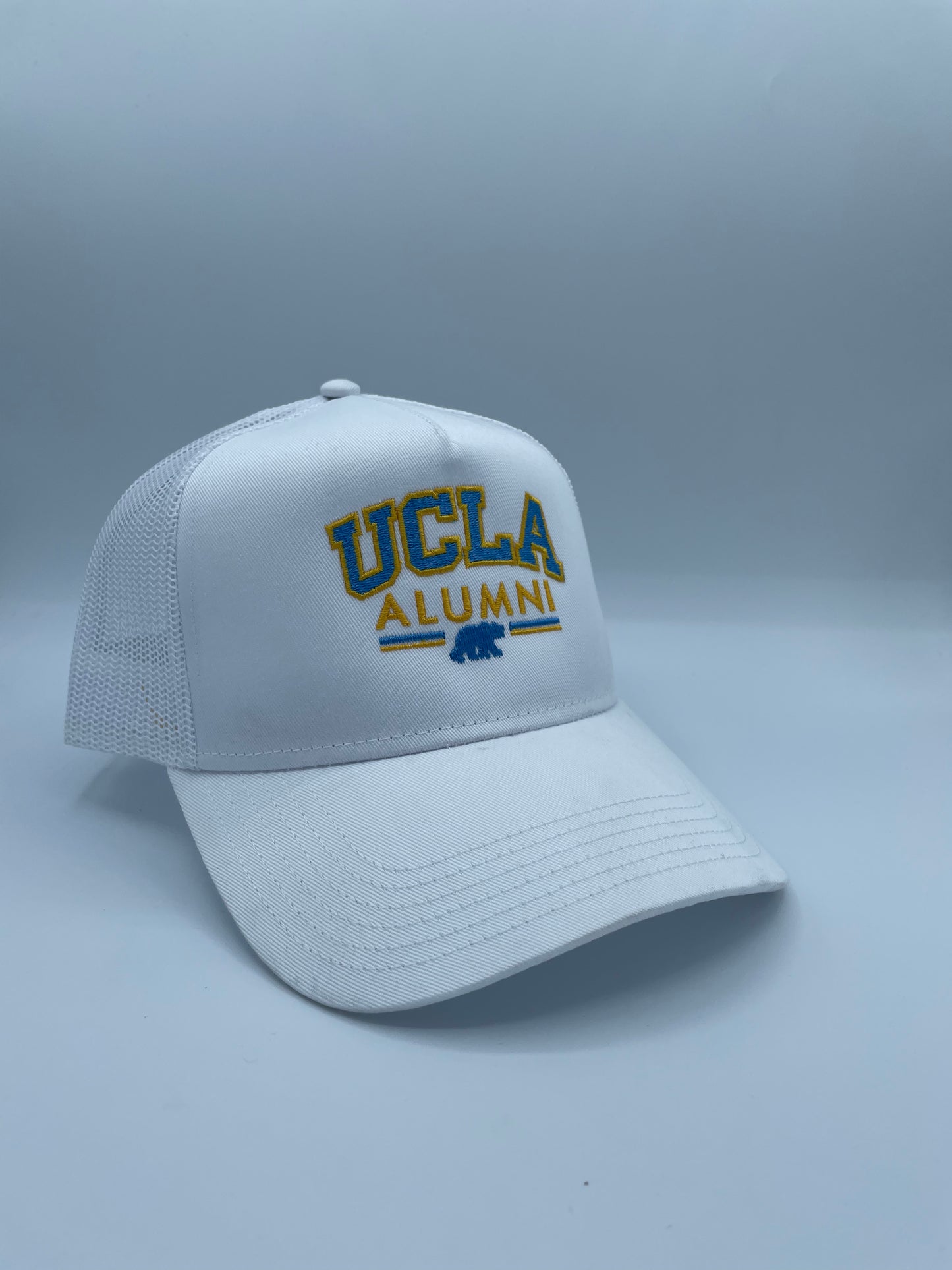 UCLA Alumni Embroidered Trucker Hat.